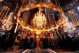 Άξιον Εστίν ως αληθώς, Μιχαήλ Χατζηαθανασίου, ήχος Α΄, ψάλλουν οι Δανιηλαίοι μοναχοί.